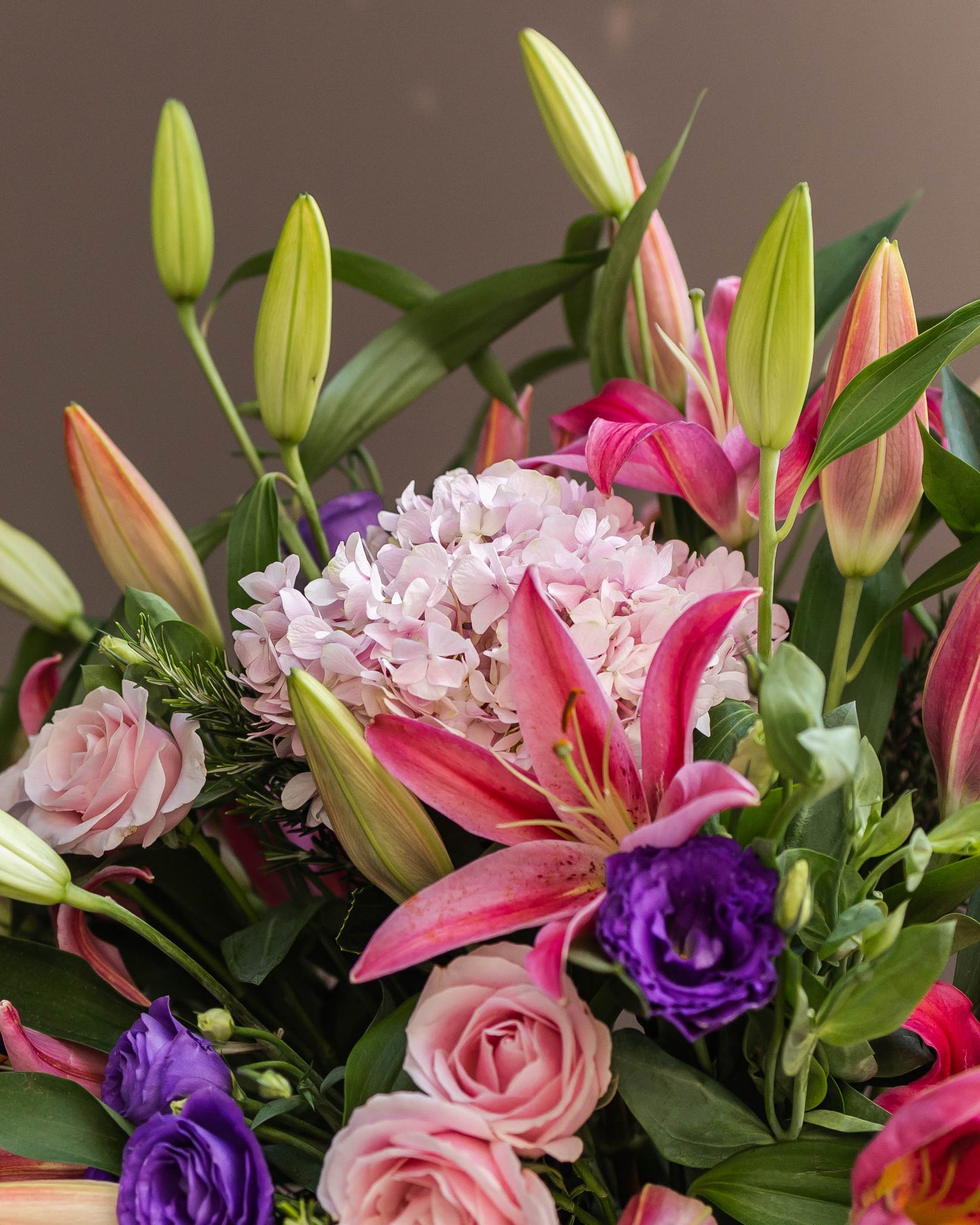 Elegant bouquet of pink fragrant Oriental lilies and pale pink hydrangeas with lush green fillers – a perfect blend of beauty and romance