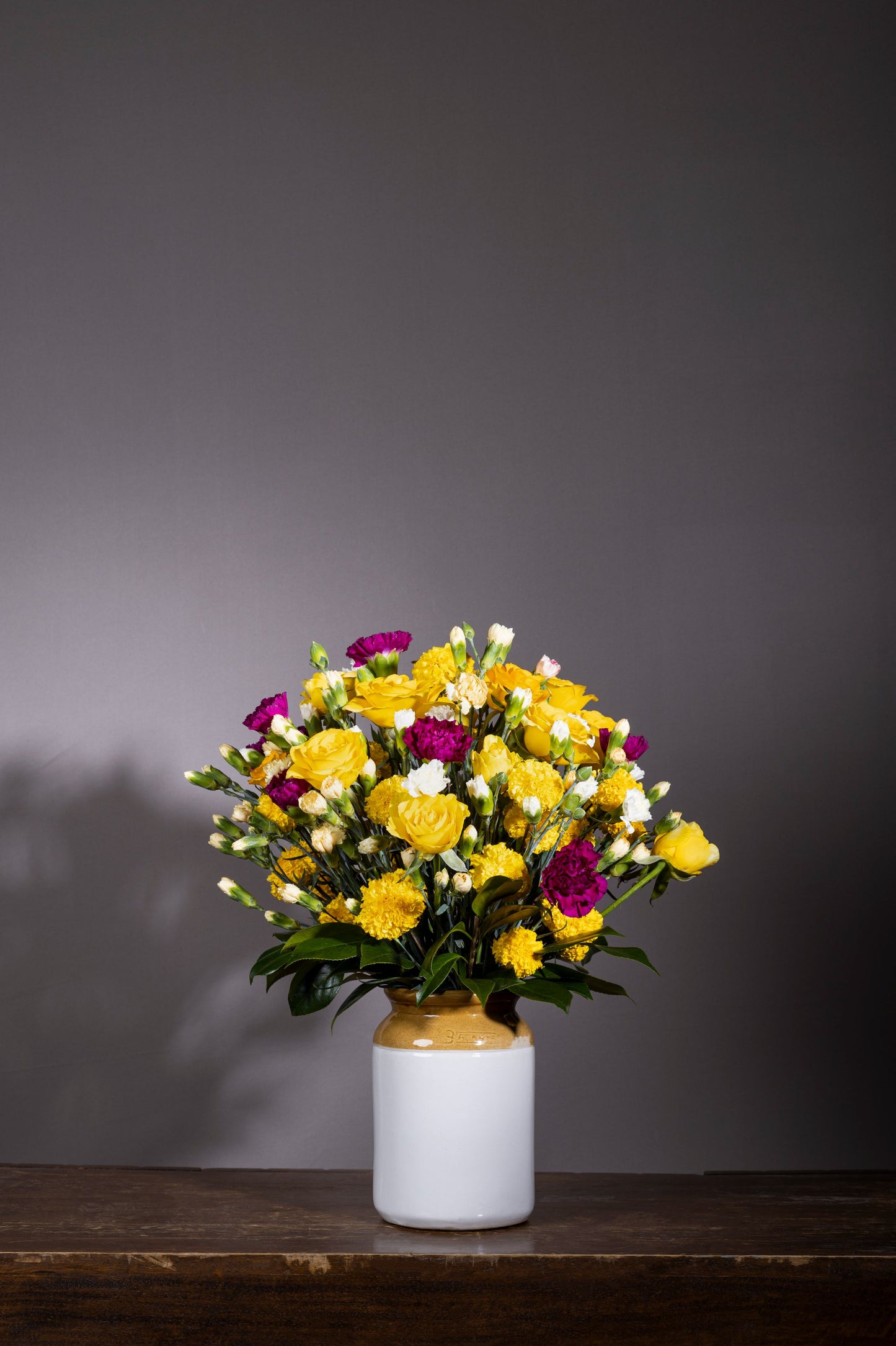 SOFT POWER | Beautiful yellow Roses, Purple Carnation stems, and White Spray Carnation stems in a pickle jar – Flower delivery in Bengaluru, Buy flower bouquets online Bengaluru, Same-day flower delivery Bengaluru, Online florist Bengaluru, Order flowers online Bengaluru, Luxury flower bouquet in Bengaluru