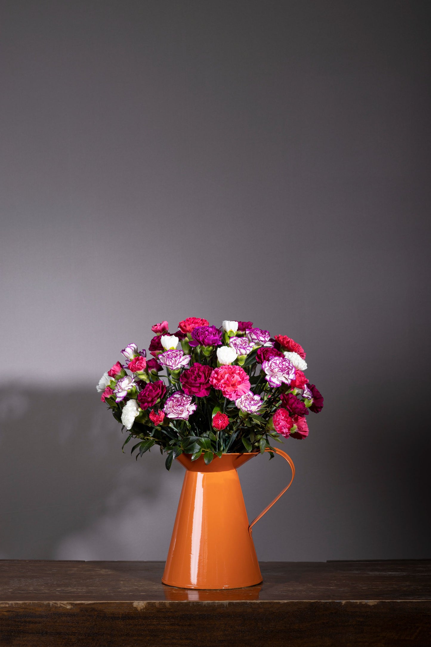 Autumn Beauty β A vibrant mix of Lisianthus blossoms, Spray Carnations, and exotic foliage arranged in a charming pickle jar, perfect for birthdays, anniversaries, thank you gifts, congratulations, and new baby celebrations. πΏπΈ Flower delivery in Bengaluru | Buy flower bouquets online Bengaluru | Same-day flower delivery Bengaluru | Online florist Bengaluru | Order flowers online Bengaluru | Luxury flower bouquet in Bengaluru