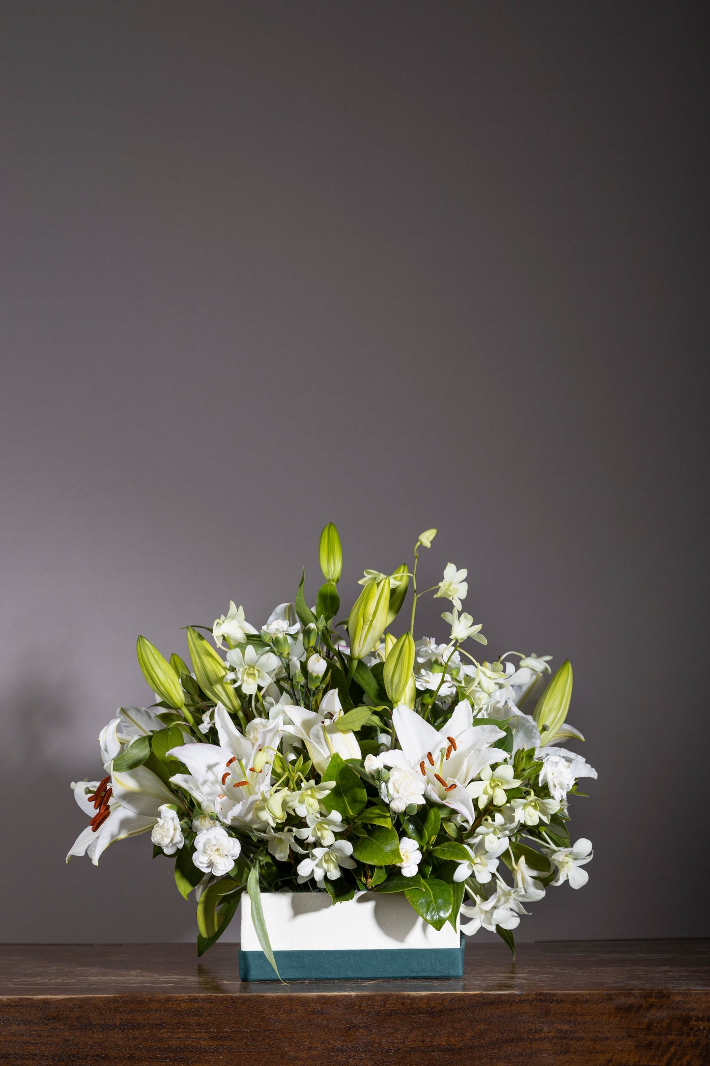 PURE JOY bouquet with white Oriental Lilies and Pure White Orchid stems in a custom keepsake box – Flower delivery in Bengaluru, Buy flower bouquets online in Bengaluru, Same-day flower delivery Bengaluru, Online florist Bengaluru, Order flowers online Bengaluru, Luxury flower bouquet in Bengaluru