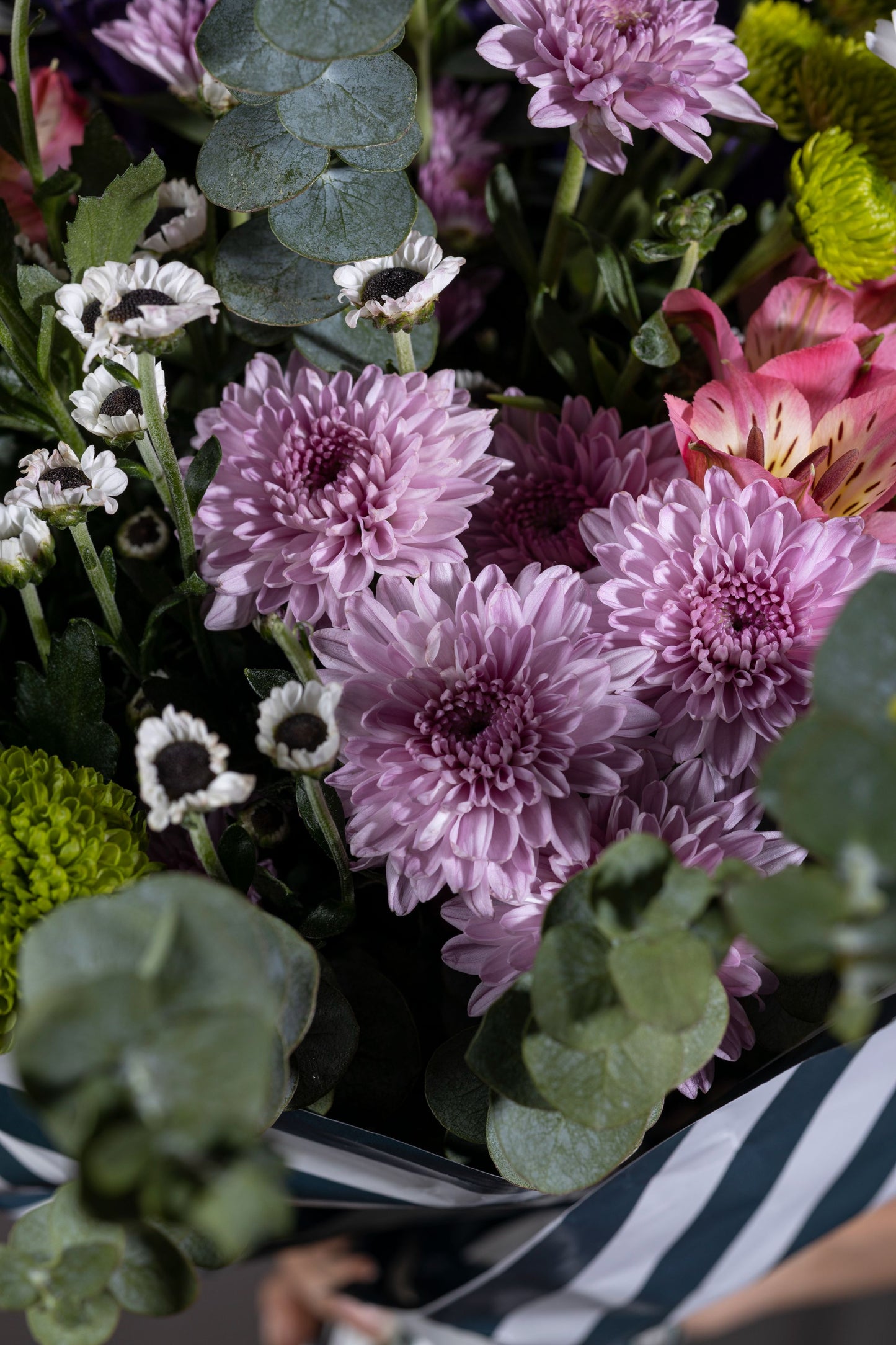 Misty Beauty - Mixed color spring flower bouquet in custom contemporary wrapping paper | Flower delivery in Bengaluru | Buy flower bouquets online in Bengaluru | Same-day flower delivery Bengaluru | Online florist Bengaluru | Order flowers online Bengaluru | Luxury flower bouquet in Bengaluru