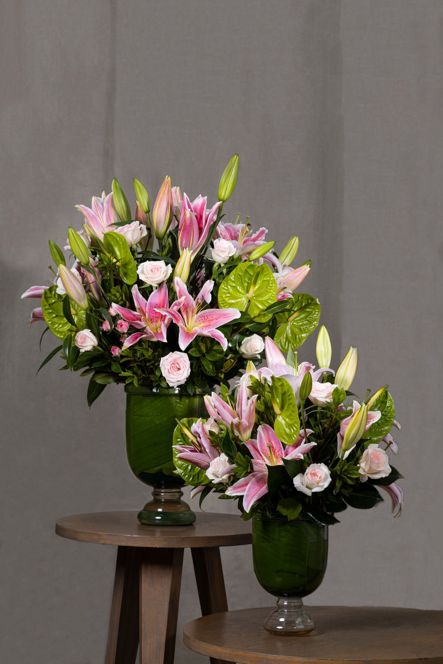 TWINNING IN PINK - A delightful floral arrangement featuring pink Oriental Lilies, Green Anthuriums, and White Carnation blooms in two elegant glass bell jars. Perfect for Birthdays, Anniversaries, Thank You, Congratulations, New Baby, and Condolence. Flower delivery in Bengaluru, Buy flower bouquets online Bengaluru, Same-day flower delivery Bengaluru, Online florist Bengaluru, Order flowers online Bengaluru, Luxury flower bouquet in Bengaluru