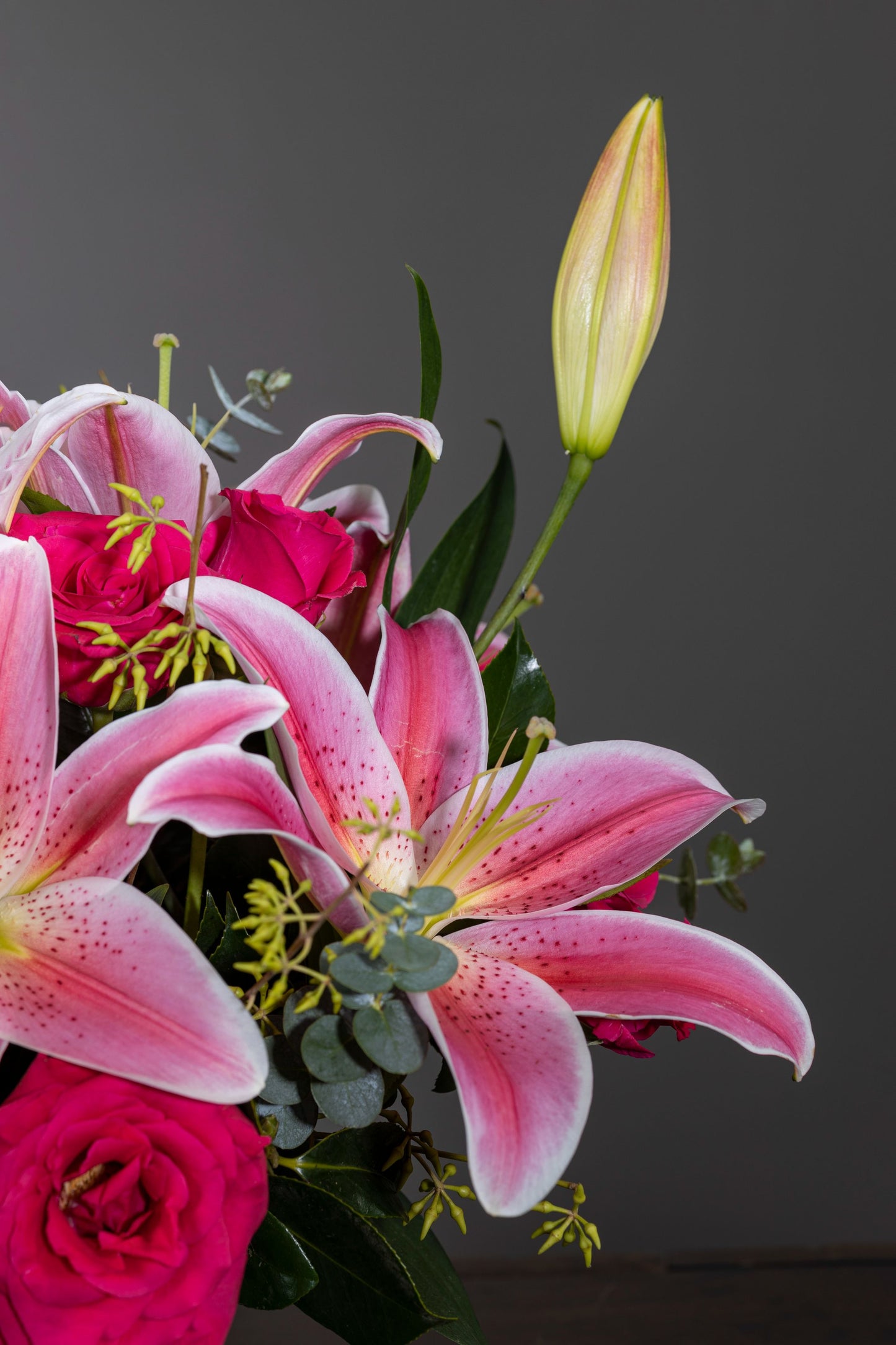 SCENT OF LOVE - A mesmerizing floral arrangement of fragrant pink Oriental Lilies and delicate Pink Carnation stems elegantly placed in a sleek glass container. Perfect for Birthdays, Anniversaries, Thank You, Congratulations, and New Baby. Flower delivery in Bengaluru, Buy flower bouquets online in Bengaluru, Same-day flower delivery Bengaluru, Online florist Bengaluru, Order flowers online Bengaluru, Luxury flower bouquet in Bengaluru