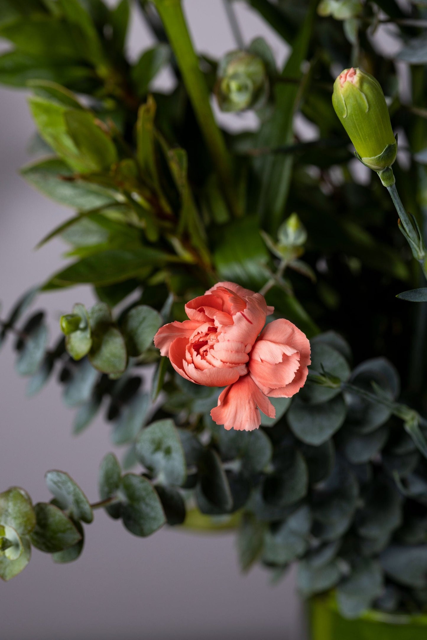 GRACIOUS | Best bouquet flowers in Bengaluru ohanafineflowers: Same-day delivery featuring lush Asiatic Red Lilies and baby Chrysanthemum flowers in a custom glass container, perfect for Birthdays, Anniversaries, Thank You, and Congratulations gifts