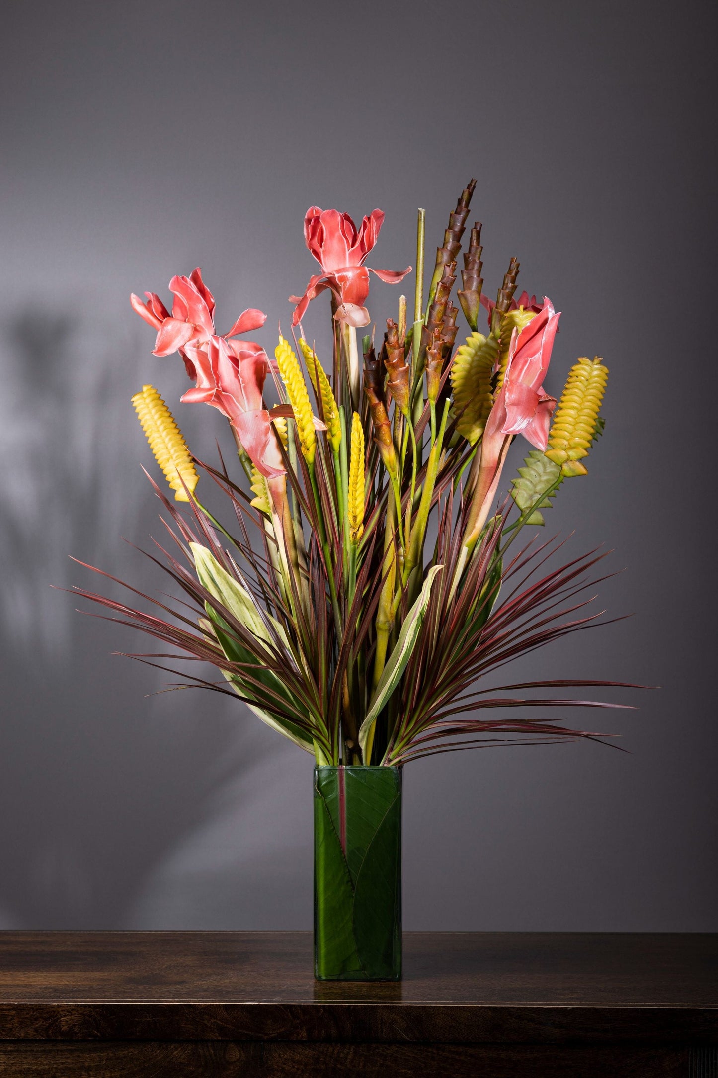 In Awe – In Awe bouquet flowers in Bengaluru featuring a tropical blend of Calatheas, Torch Gingers, and Dracaena fillers, perfect for Birthdays, Anniversaries, Thank You, and Congratulations gifts